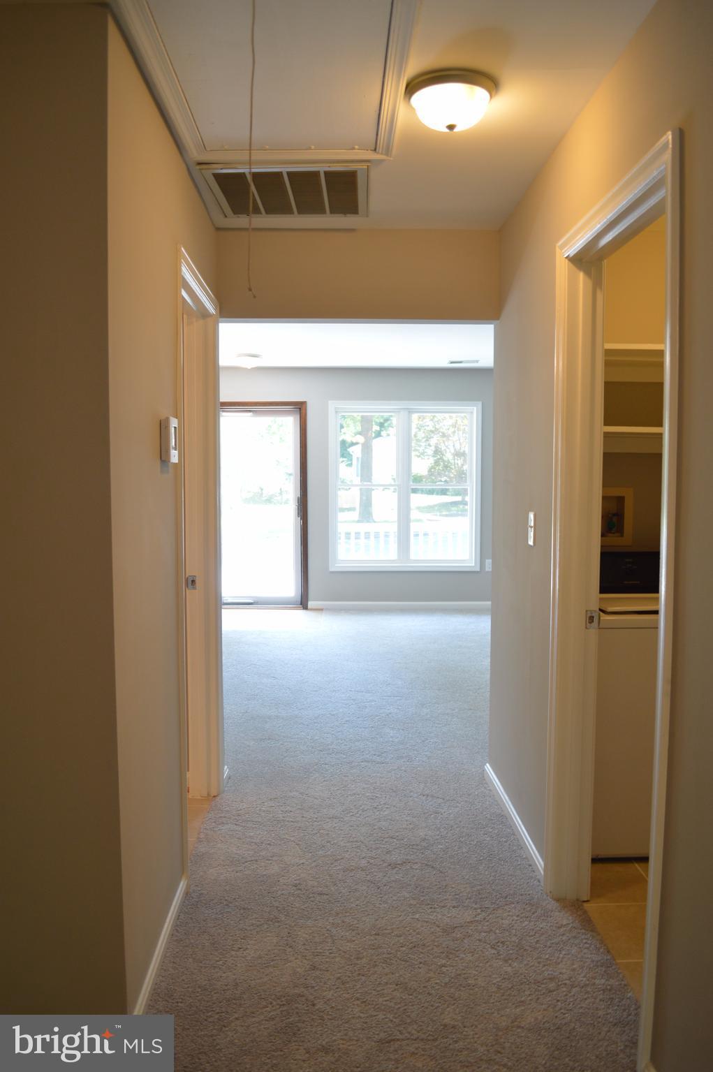 934 Riversedge Circle Annapolis, MD 21401 - Photo 9 of 25 a view of an empty room with a window