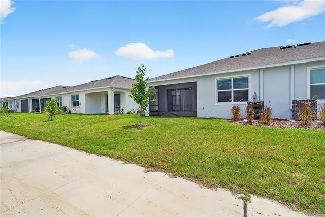a view of a golf course with a lake