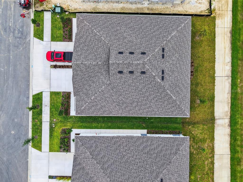 31463 Paper Birch Street Wesley Chapel, FL 33545 - Photo 7 of 40 a view of building with yard
