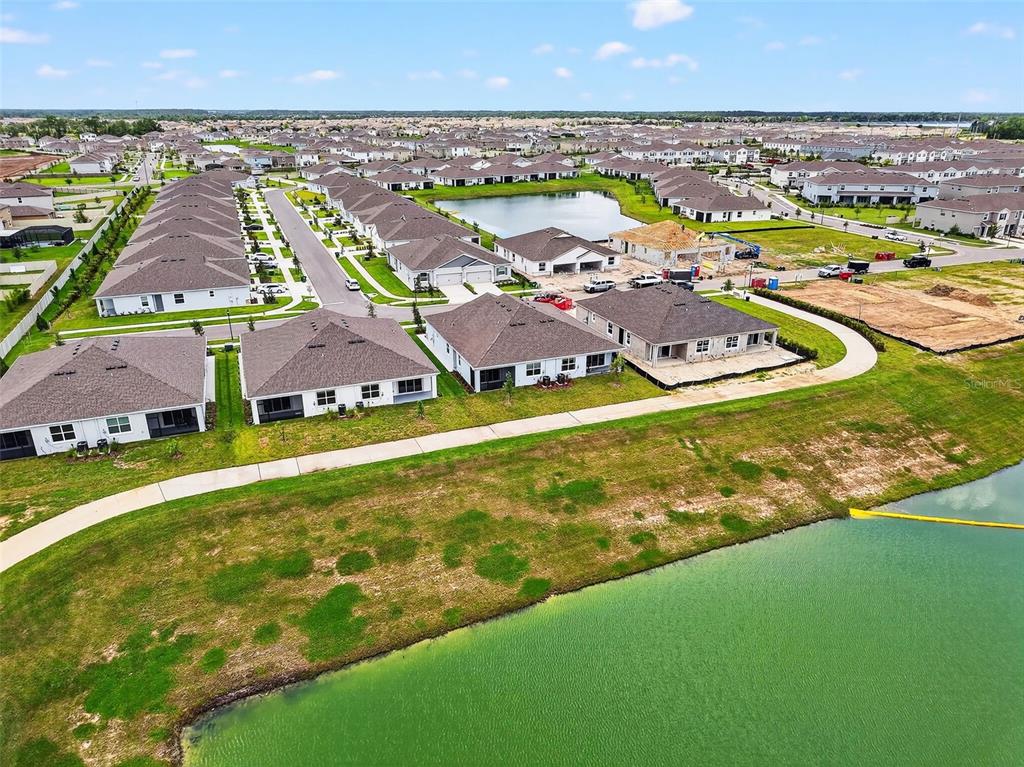 31463 Paper Birch Street Wesley Chapel, FL 33545 - Photo 8 of 40 an aerial view of residential houses with outdoor space