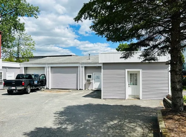 a view of a car in front of house