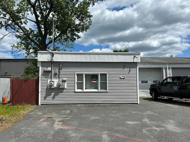 a car parked in front of a house