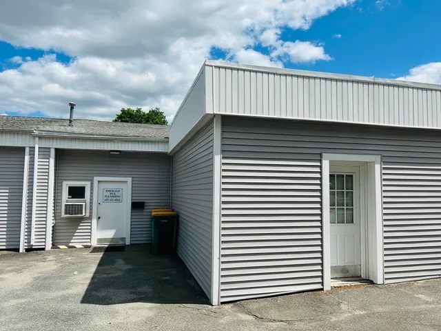 a view of a house with a roof deck
