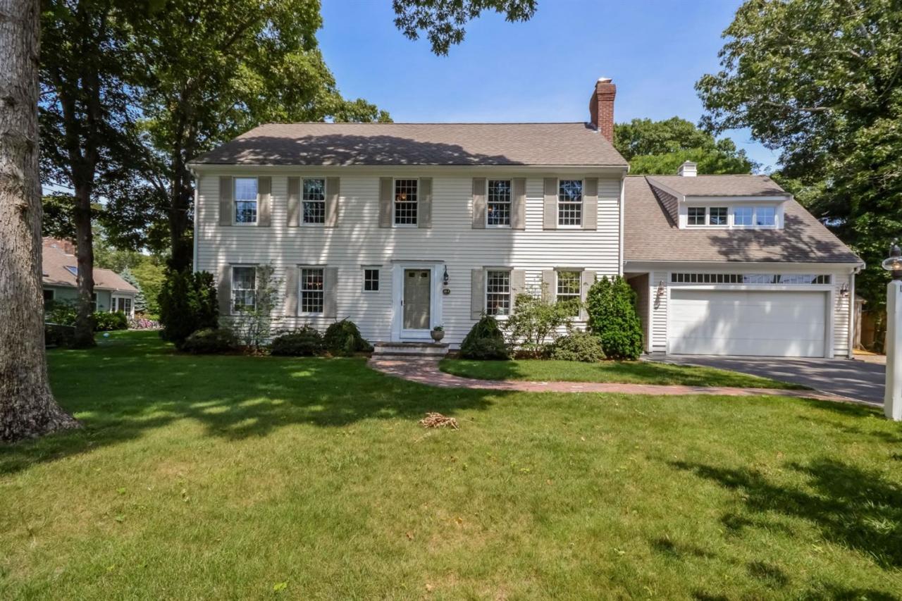 164 Scudder Road Osterville, MA 02655 - Photo 1 of 30 a front view of a house with a garden