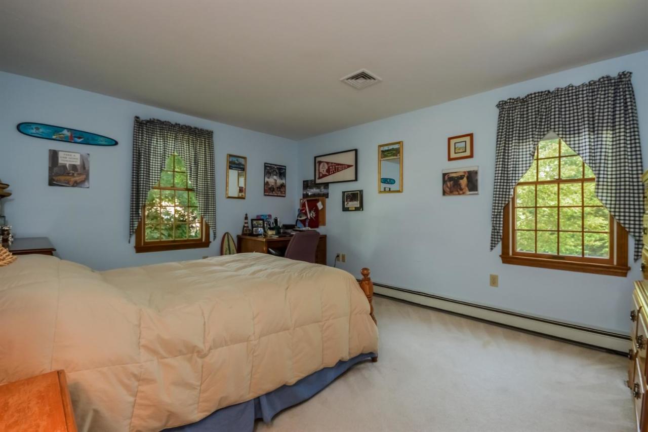 164 Scudder Road Osterville, MA 02655 - Photo 16 of 30 a bedroom with a bed and a window
