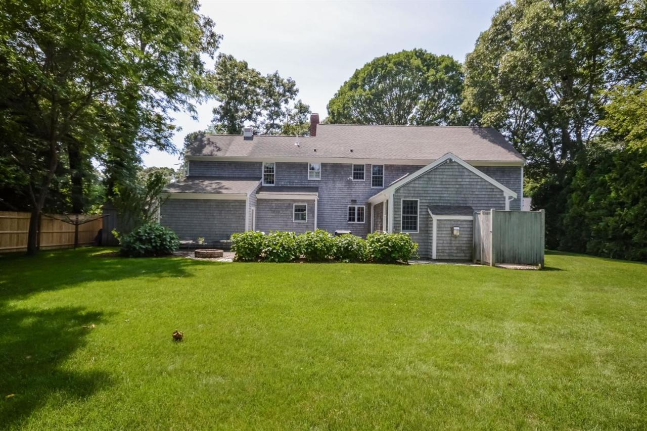 164 Scudder Road Osterville, MA 02655 - Photo 24 of 30 a front view of a house with garden
