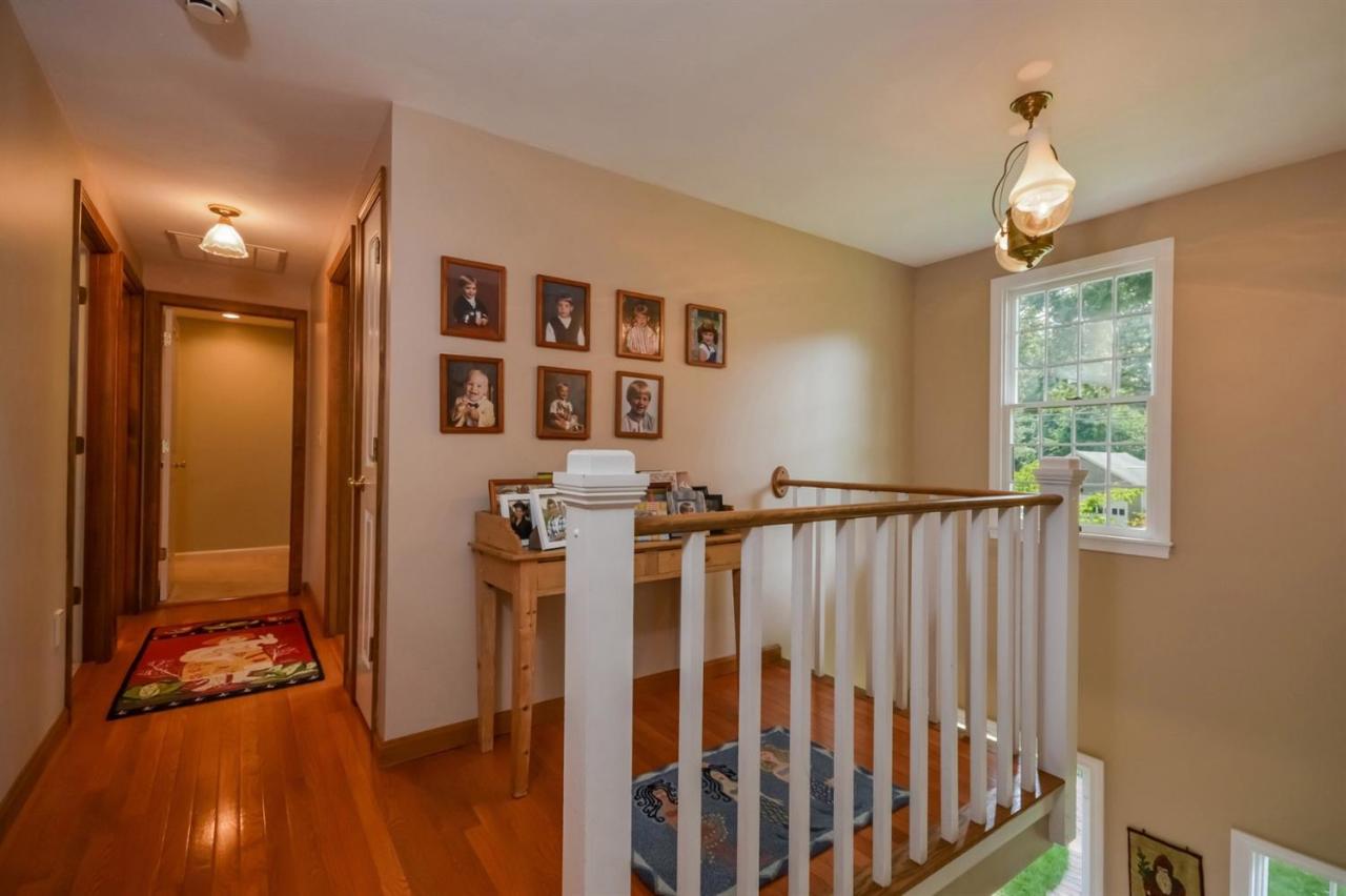 164 Scudder Road Osterville, MA 02655 - Photo 7 of 30 a view of a hallway with windows and entryway