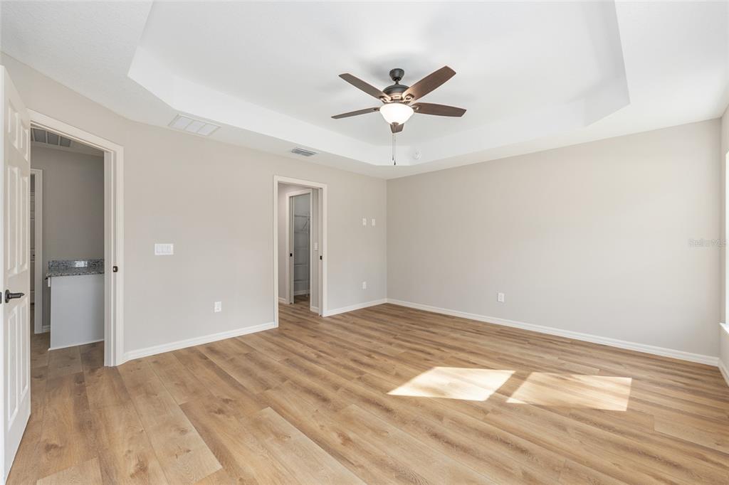 5796 Southwest 124th Ter Road Ocala, FL 34481 - Photo 23 of 63 a view of a big room with wooden floor and closet in a room