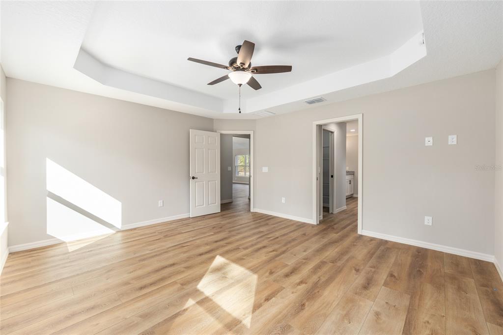5796 Southwest 124th Ter Road Ocala, FL 34481 - Photo 24 of 63 a view of empty room with wooden floor