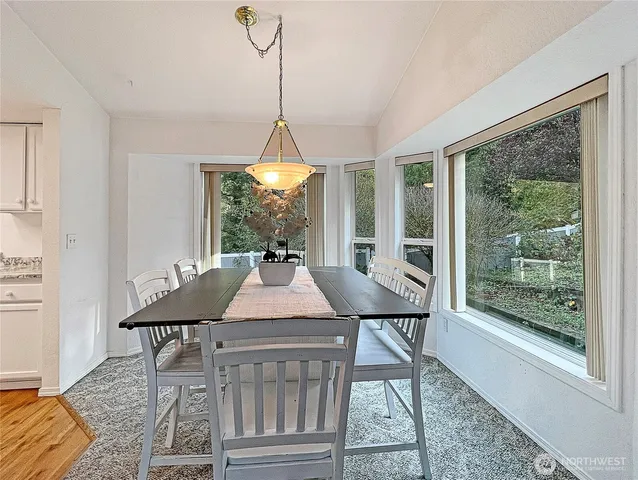 a table and chairs in a room