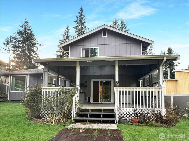 front view of a house with a yard