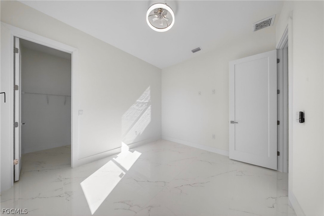 4013 12th Street Southwest Lehigh Acres, FL 33976 - Photo 12 of 29 a view of an empty room