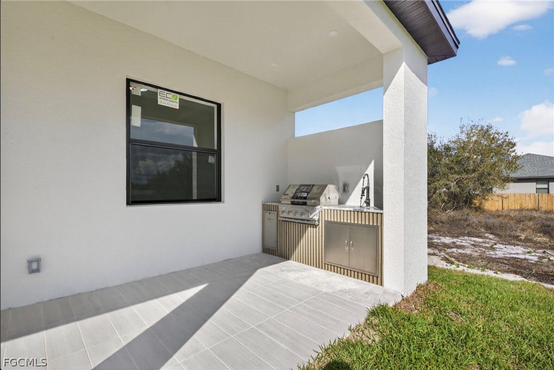4013 12th Street Southwest Lehigh Acres, FL 33976 - Photo 21 of 29 a bedroom with a bed and a view of living room