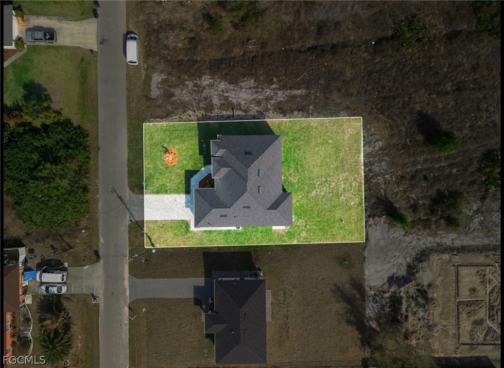 4013 12th Street Southwest Lehigh Acres, FL 33976 - Photo 29 of 29 an aerial view of a residential houses with outdoor space