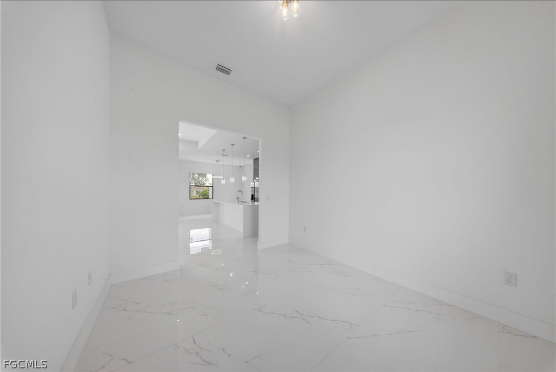 4013 12th Street Southwest Lehigh Acres, FL 33976 - Photo 10 of 29 a view of gallery and yard