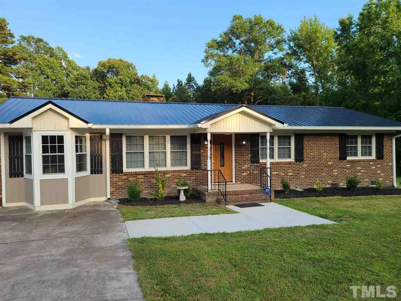 67 Dick Smith Road Kittrell, NC 27544 - Photo 1 of 21 newly concreted walkway,new metal roof,gutters and shutters
