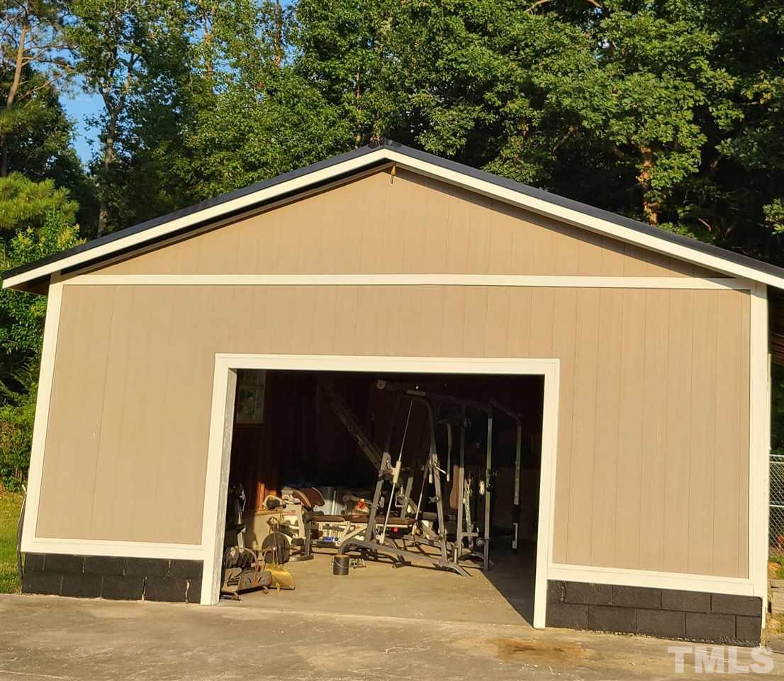 67 Dick Smith Road Kittrell, NC 27544 - Photo 3 of 21 garage completely redone new roof,new door, new siding
