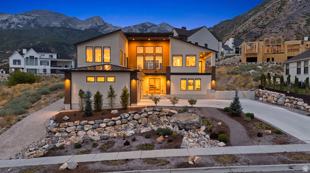 1445 Jacob Road Sandy, UT 84092 - Photo 42 of 52 Contemporary architectural style with a flat roofline, multi-pane windows, and a prominent balcony