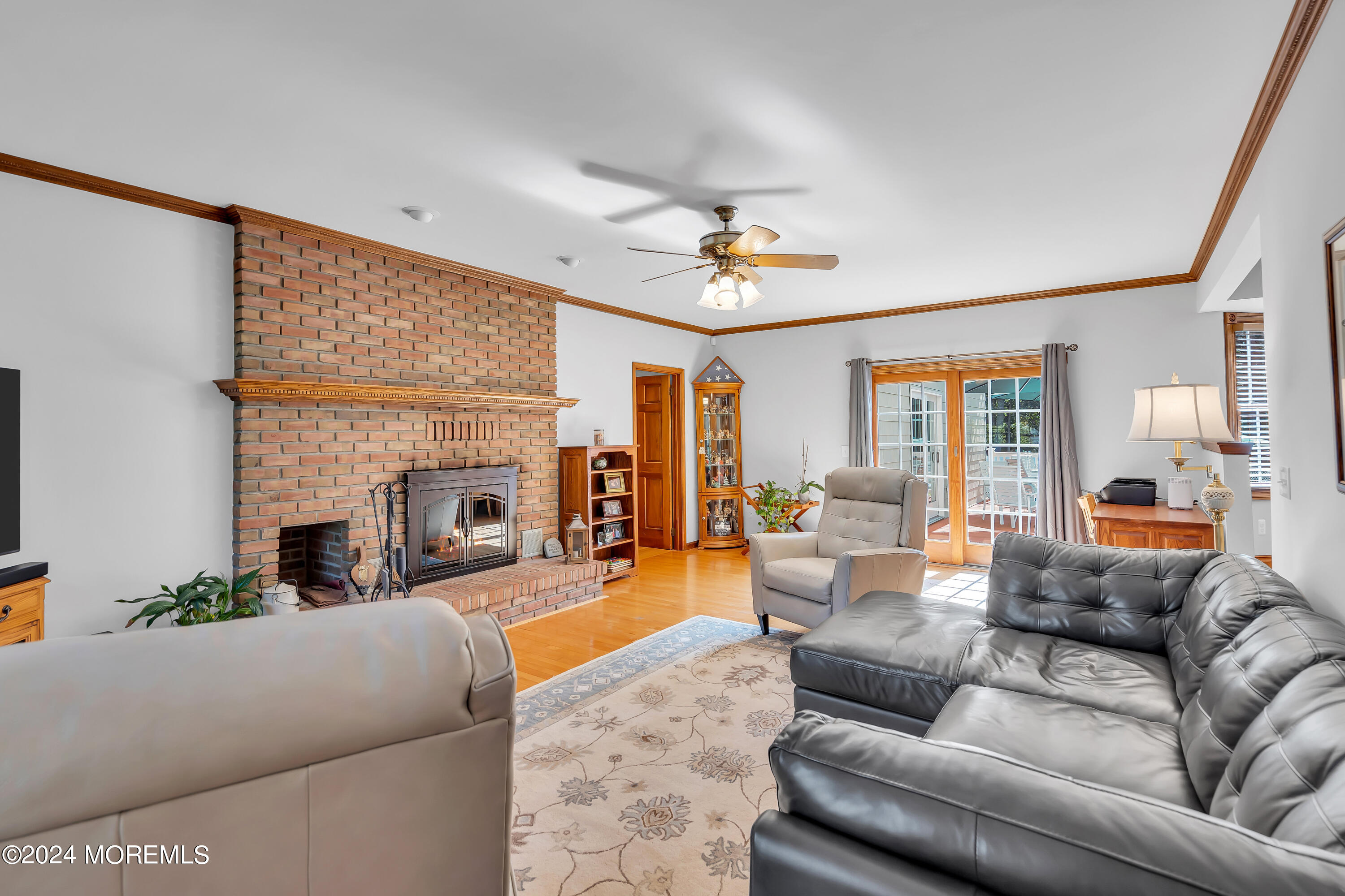 519 Admirals Circle Pine Beach, NJ 08741 - Photo 13 of 72 a living room with furniture and a fireplace