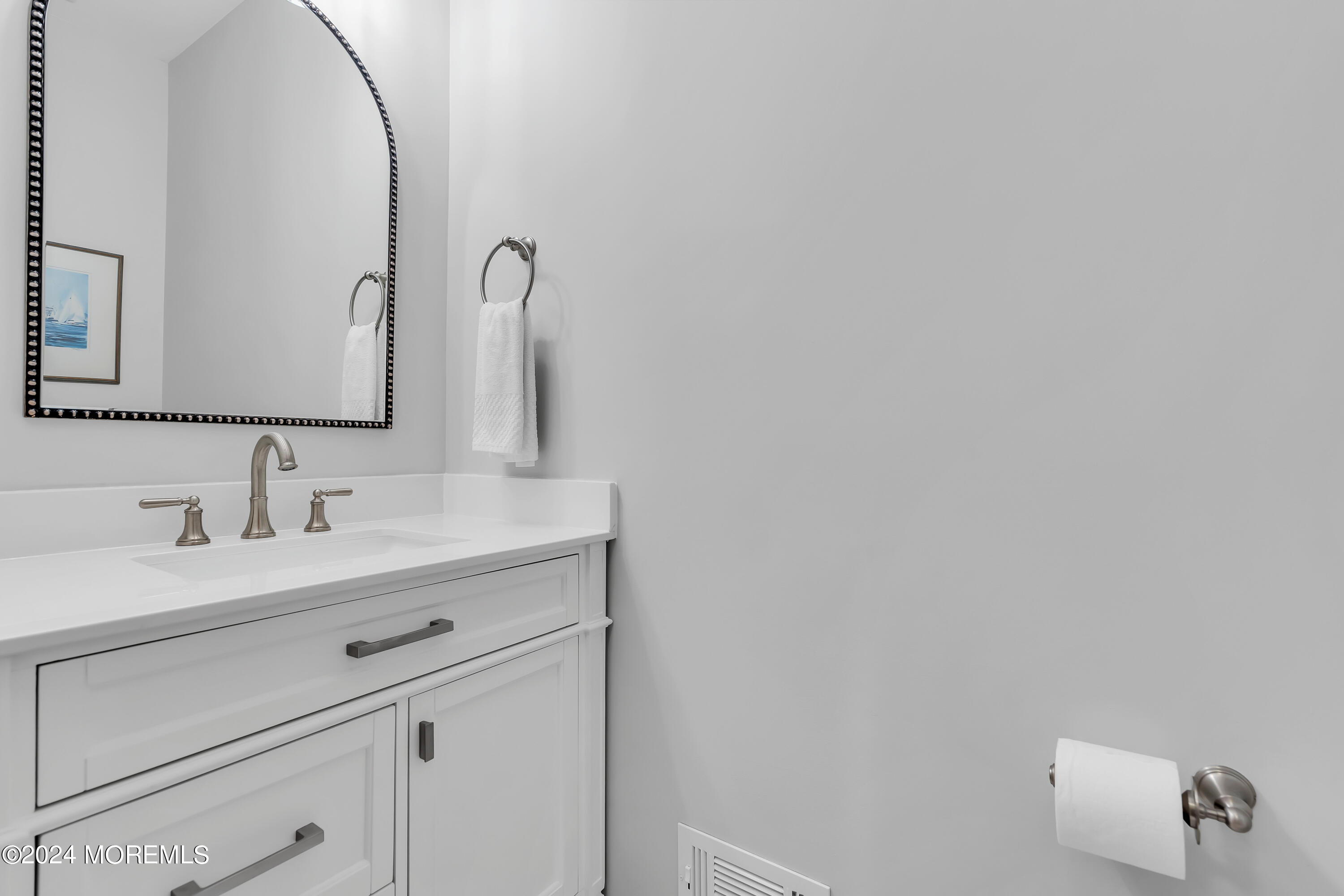 519 Admirals Circle Pine Beach, NJ 08741 - Photo 29 of 72 a bathroom with a sink and a mirror