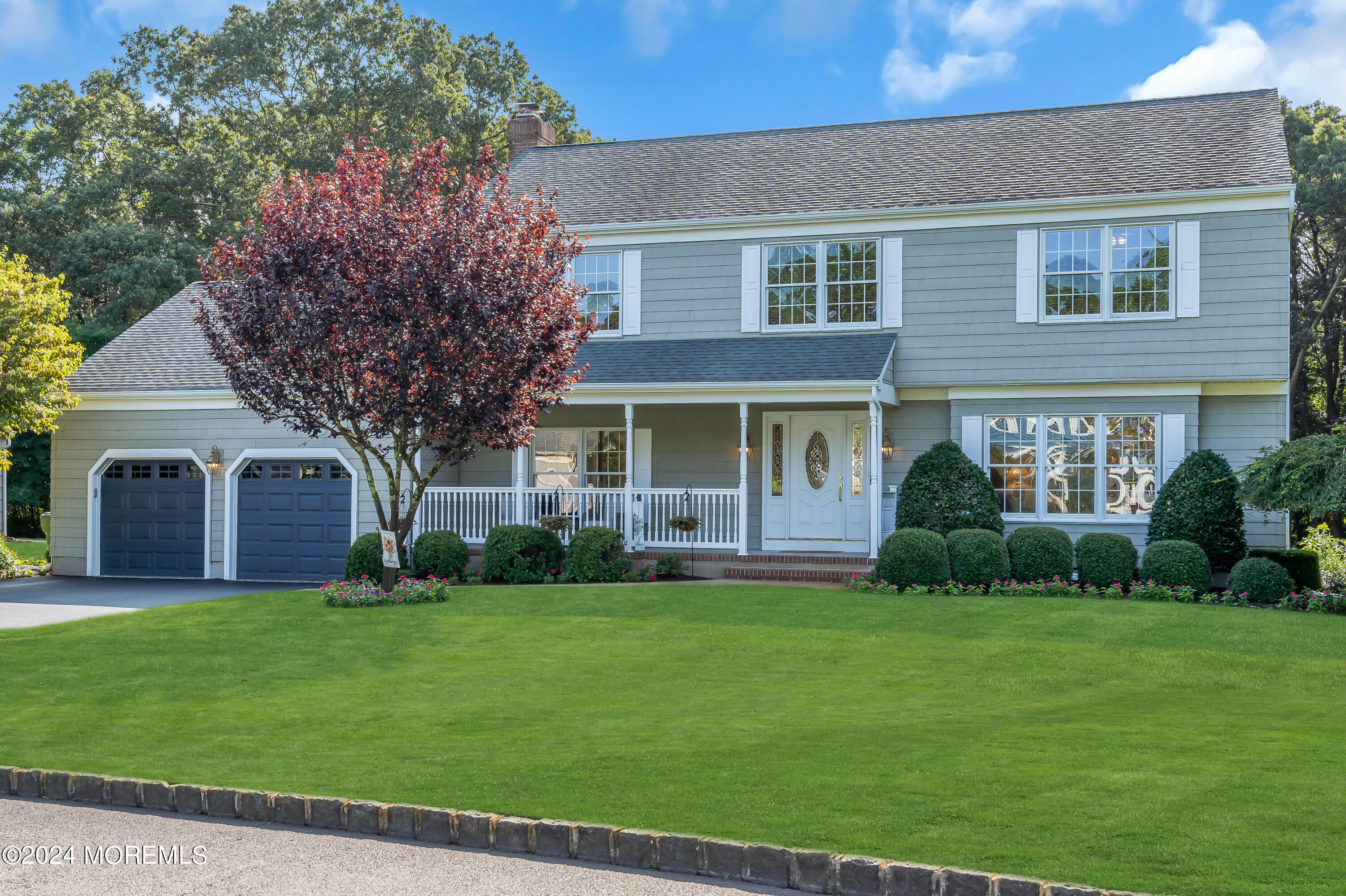 519 Admirals Circle Pine Beach, NJ 08741 - Photo 3 of 72 a front view of a house with a garden and yard