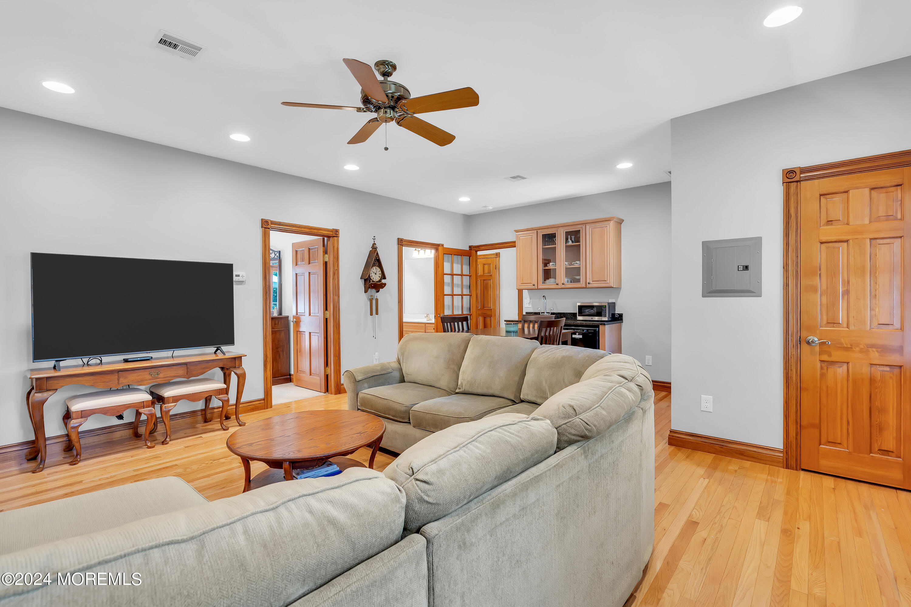 519 Admirals Circle Pine Beach, NJ 08741 - Photo 36 of 72 a living room with furniture and a flat screen tv