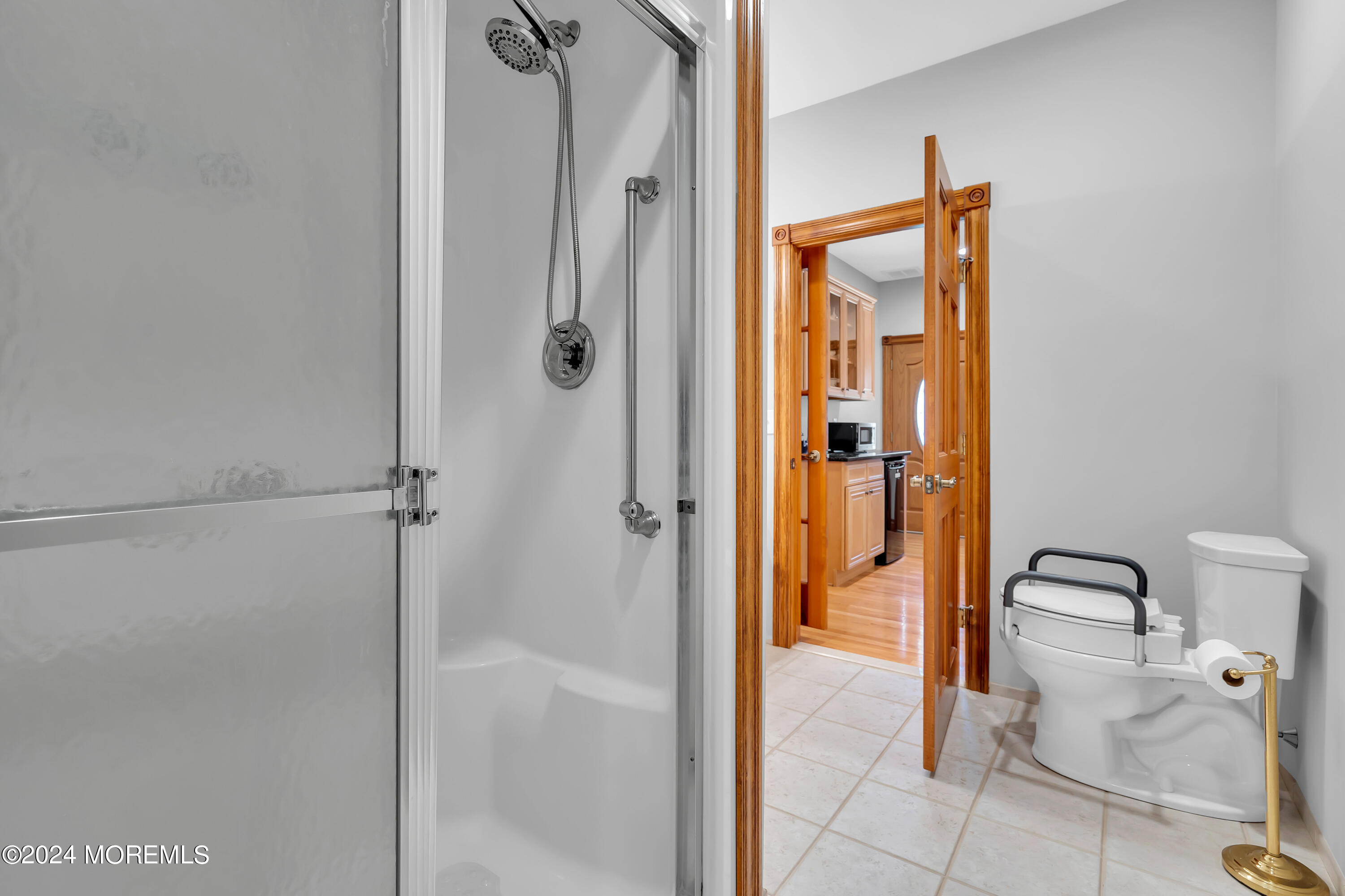 519 Admirals Circle Pine Beach, NJ 08741 - Photo 38 of 72 a bathroom with a shower and a glass door