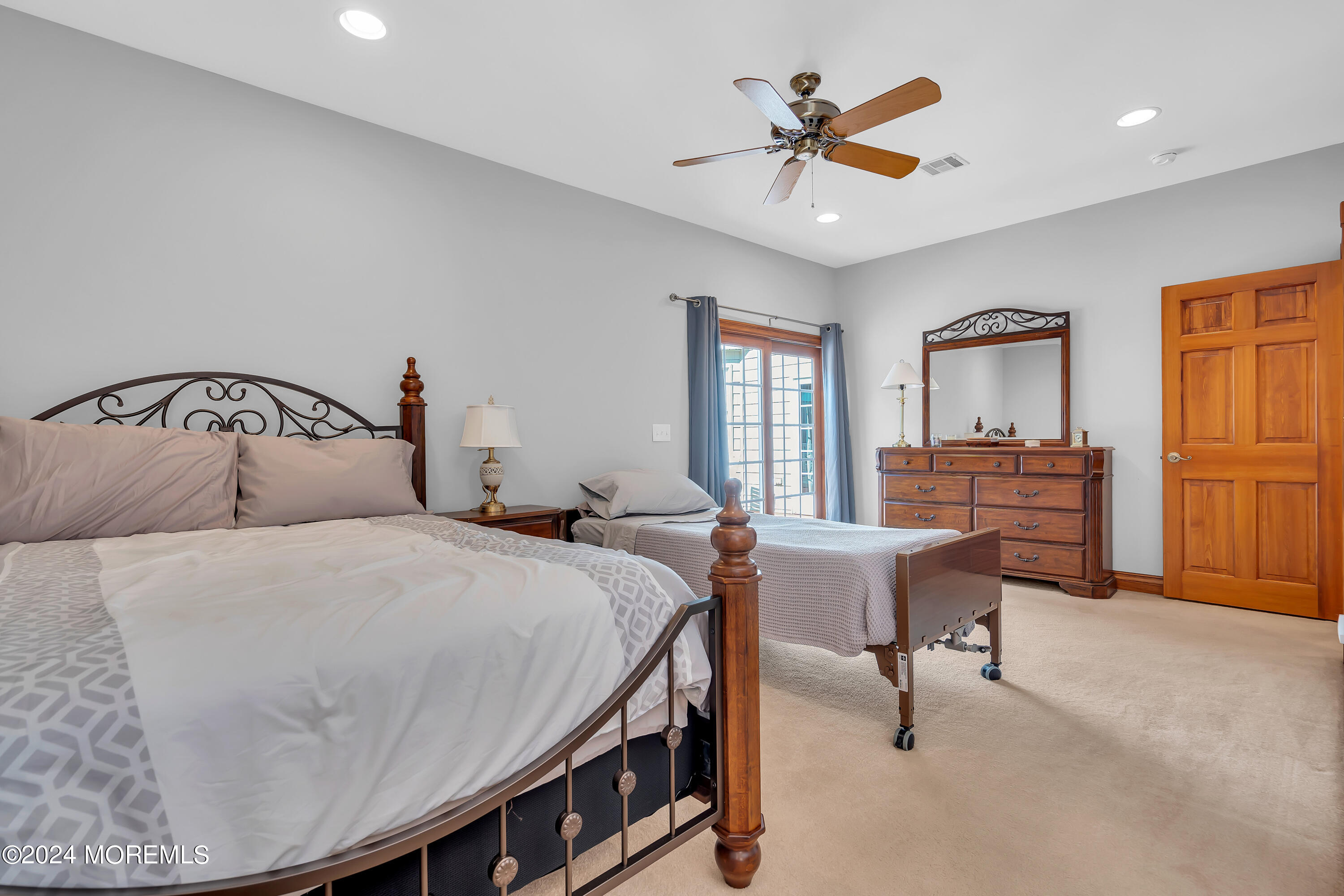 519 Admirals Circle Pine Beach, NJ 08741 - Photo 39 of 72 a bedroom with a bed and dresser with mirror