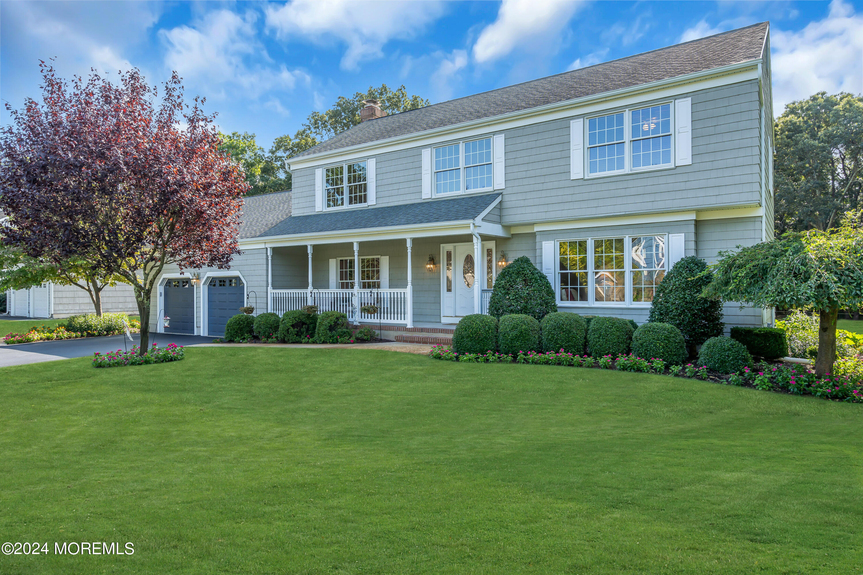 519 Admirals Circle Pine Beach, NJ 08741 - Photo 4 of 72 a front view of a house with a garden