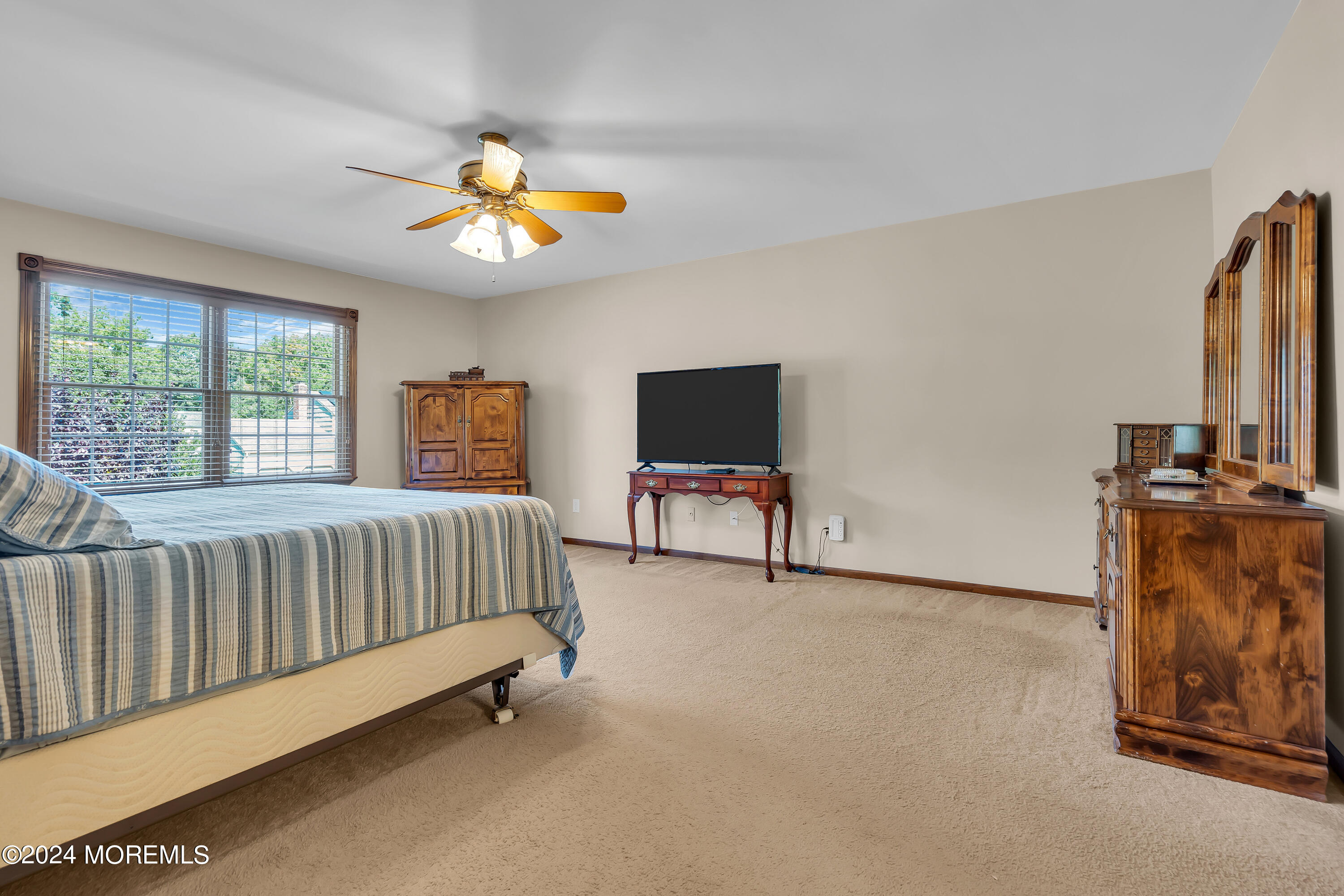 519 Admirals Circle Pine Beach, NJ 08741 - Photo 44 of 72 a bedroom with furniture and a window