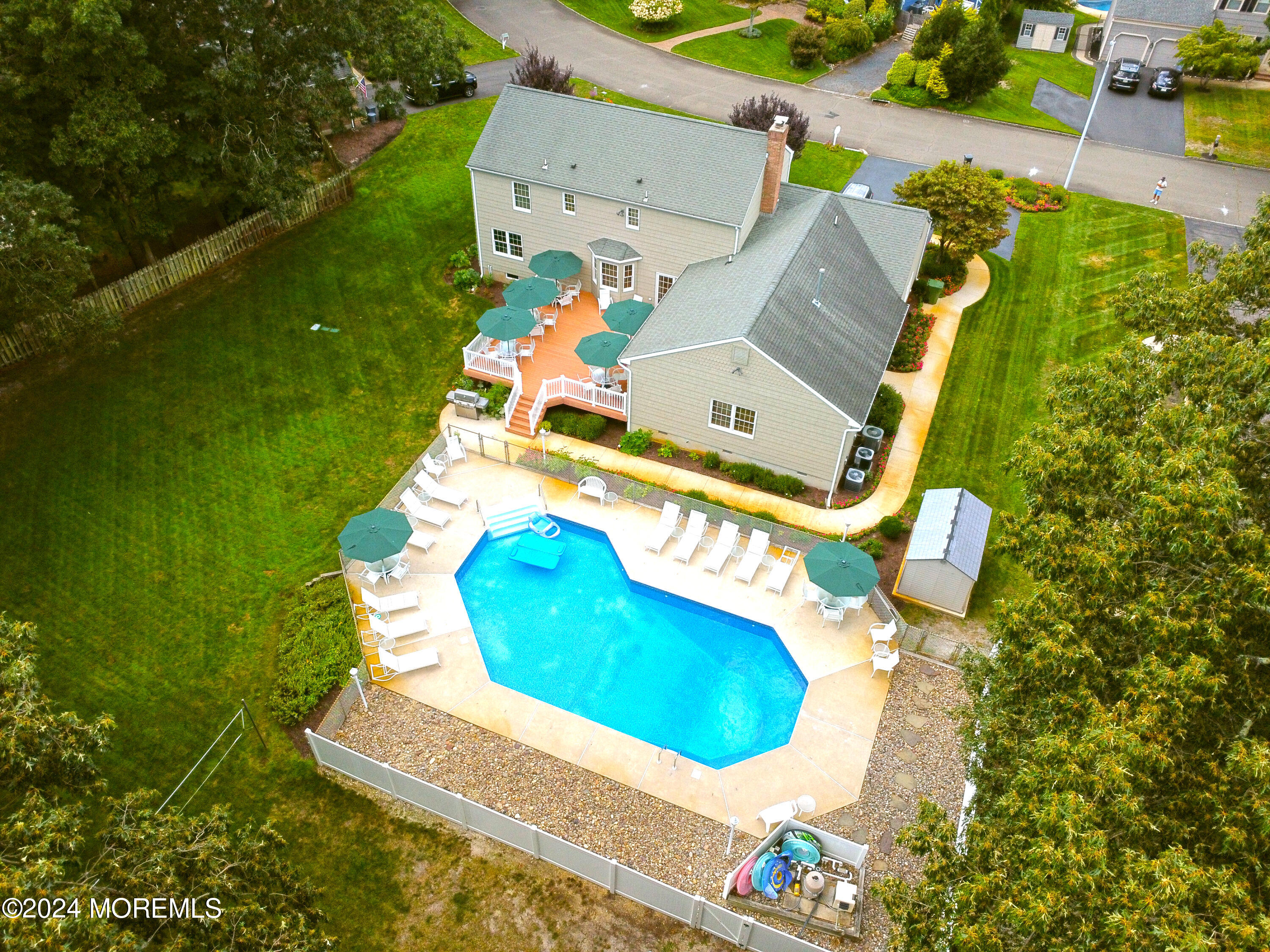 519 Admirals Circle Pine Beach, NJ 08741 - Photo 63 of 72 an aerial view of a house with swimming pool and garden view