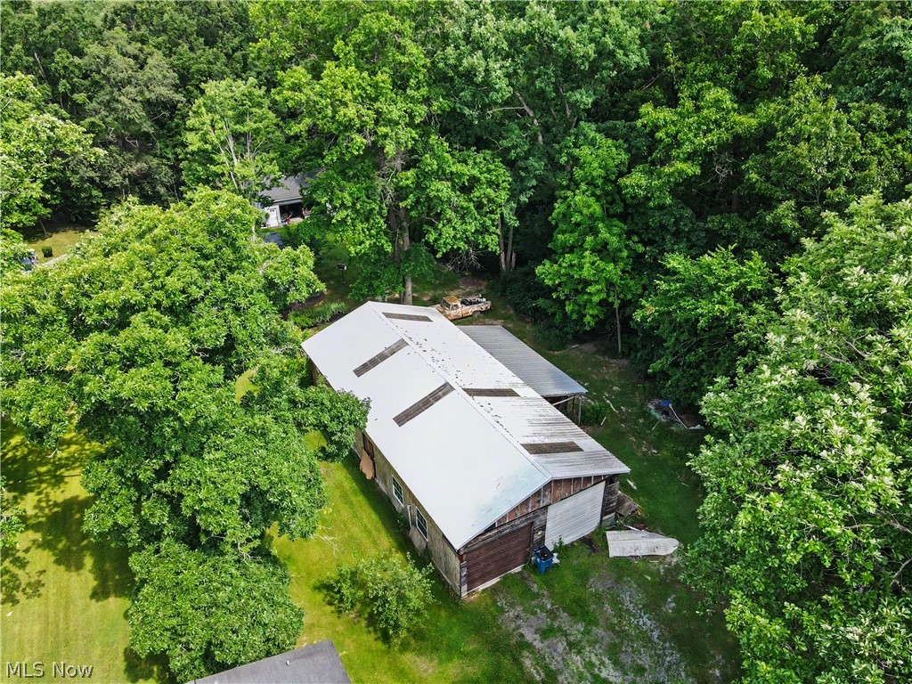 3424 Painesville Warren State Road Southington, OH 44470 - Photo 2 of 50 3424 Painesville Warren Rd, Southington, OH 44470 – Enjoy comfortable one-floor living in this well-maintained home built in 2018. Featuring 3 bedrooms, 2 full bathrooms, and an open-concept layout, this home offers both functionality and convenience. The spacious kitchen, dining, and living areas provide plenty of room for everyday living and entertaining. A large garage offers ample space for vehicles, storage, hobbies, or workshop needs. Situated on a generous lot with a welcoming front porch, this property combines modern living with a peaceful country setting. Move-in ready and waiting for its next owner!
