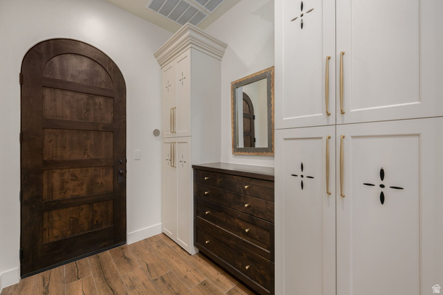 4871 South Homestead Way Washington, UT 84780 - Photo 91 of 151 Foyer entrance with dark wood-style flooring and baseboards