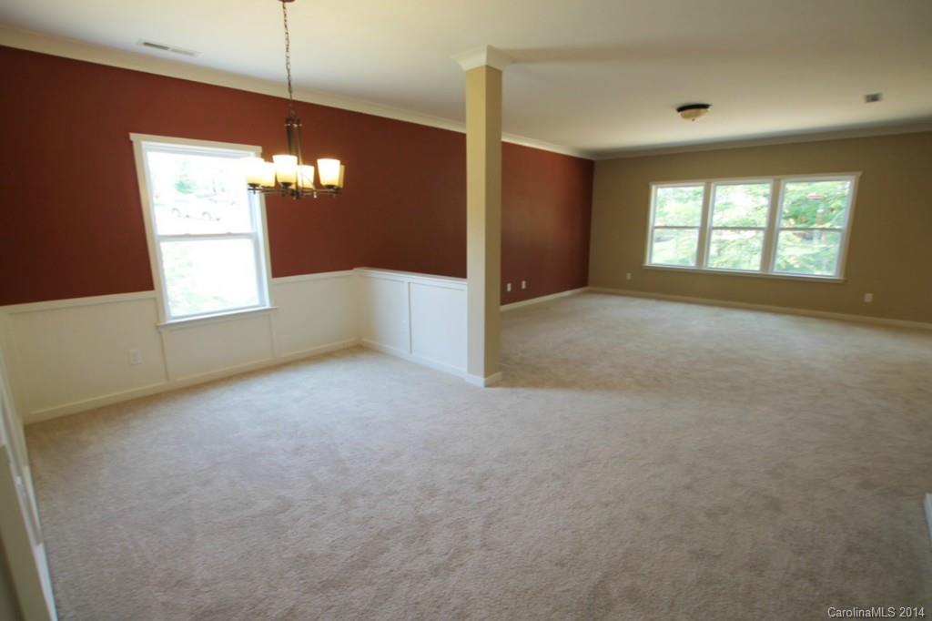 7140 Meyer Road, Unit 309 Fort Mill, SC 29715 - Photo 3 of 16 a view of an empty room with a window