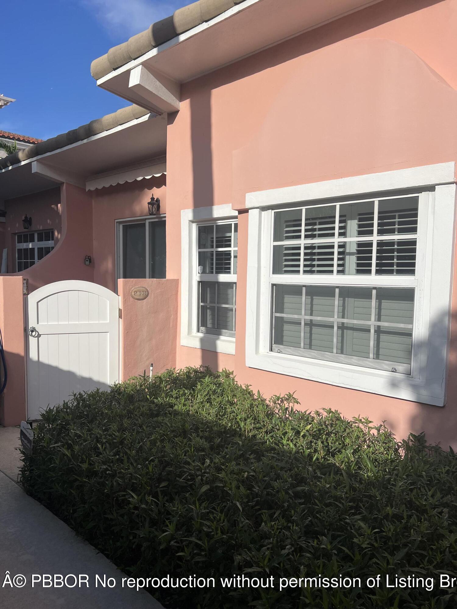 142 Peruvian Avenue, Unit 101 Palm Beach, FL 33480 - Photo 3 of 4 a house view with a garden space