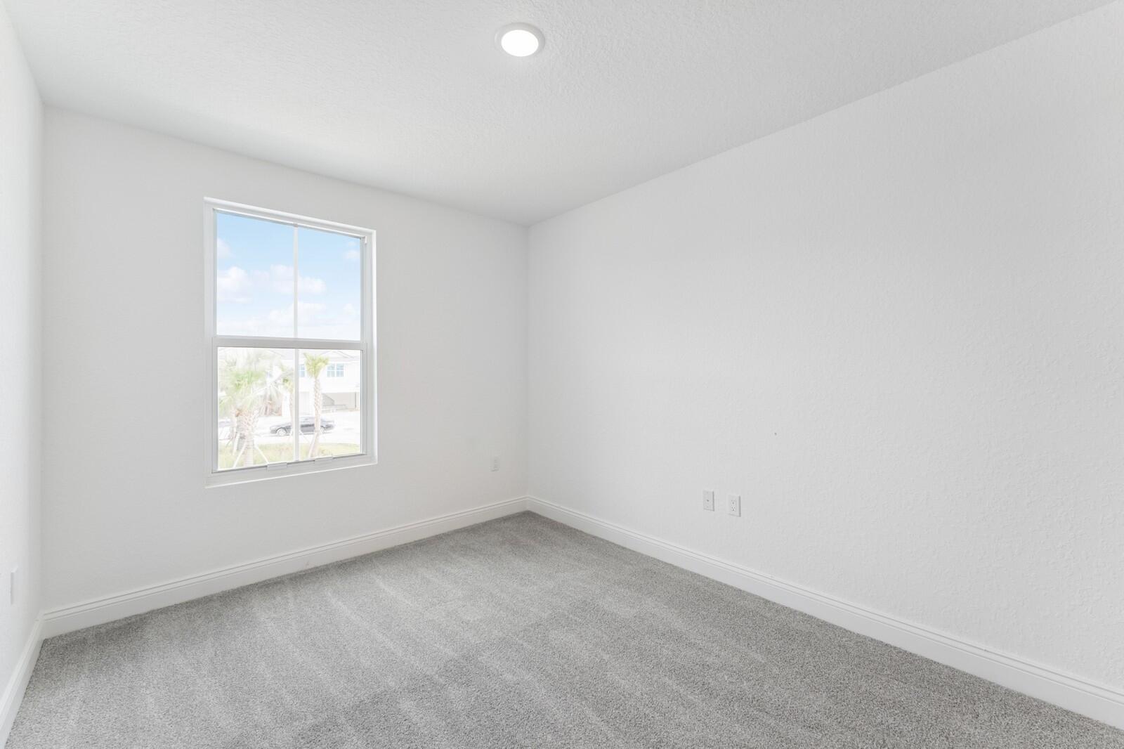 165 Southeast Birch Terrace, Unit 842 Stuart, FL 34997 - Photo 16 of 28 an empty room with windows