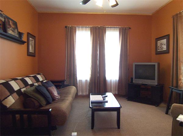 76 Sterling Street Springfield, MA 01107 - Photo 7 of 15 a living room with furniture ceiling fan and a window