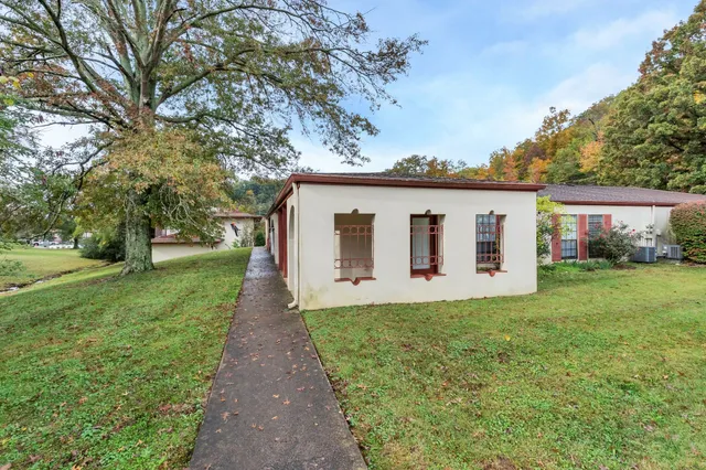a house view with a garden space