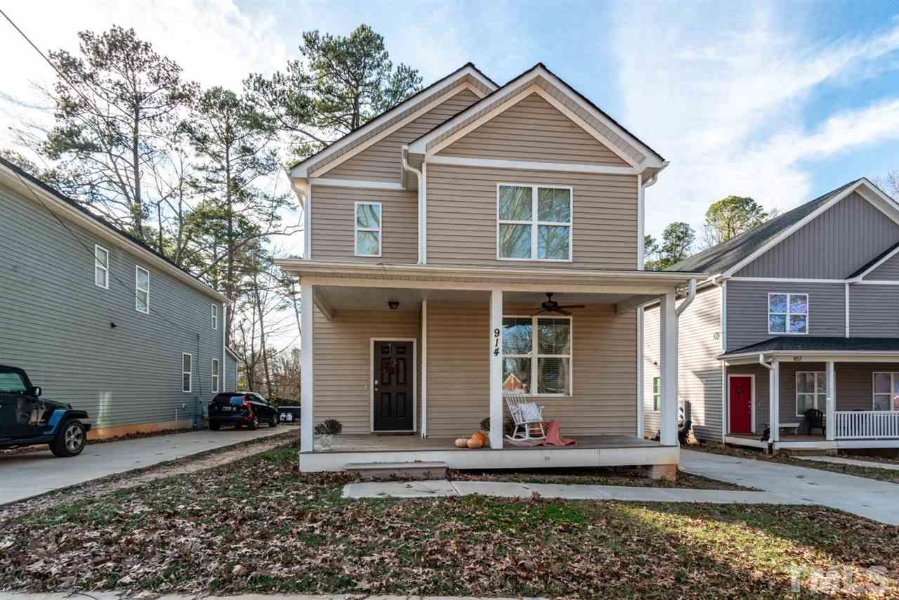 914 Chaney Road Raleigh, NC 27606 - Photo 1 of 15 a front view of a house with garden