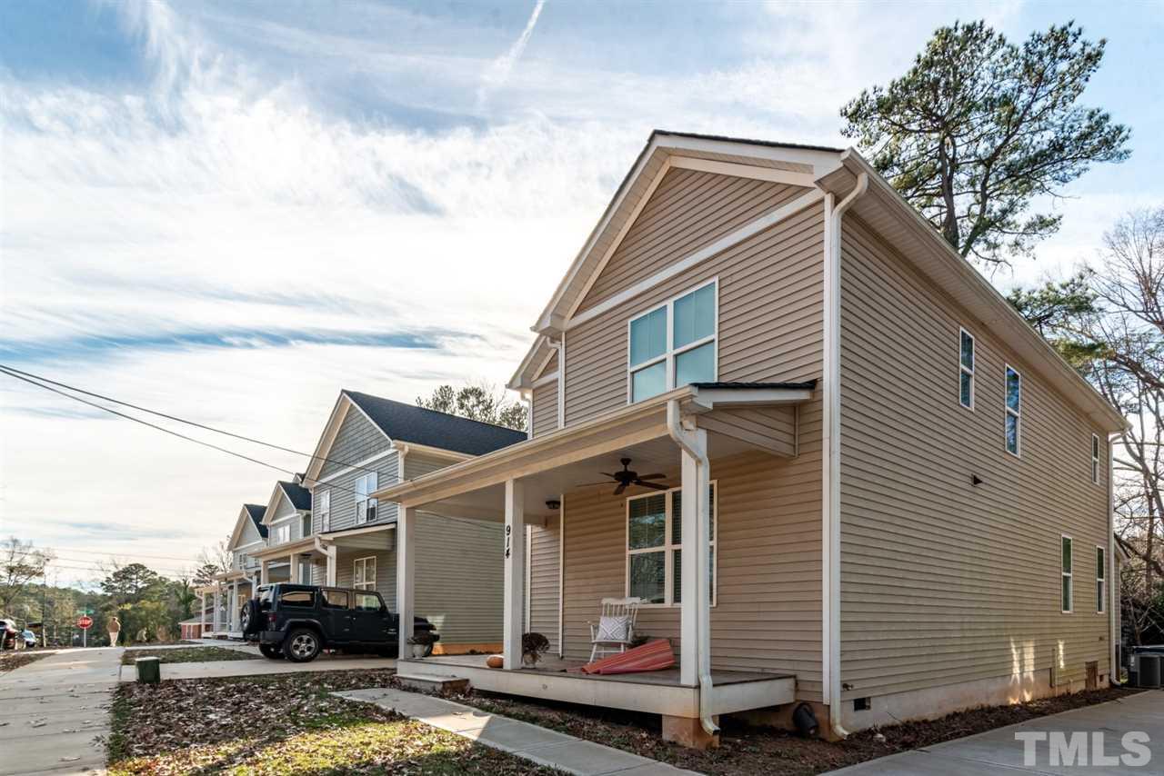 914 Chaney Road Raleigh, NC 27606 - Photo 2 of 15 a view of a house with a yard