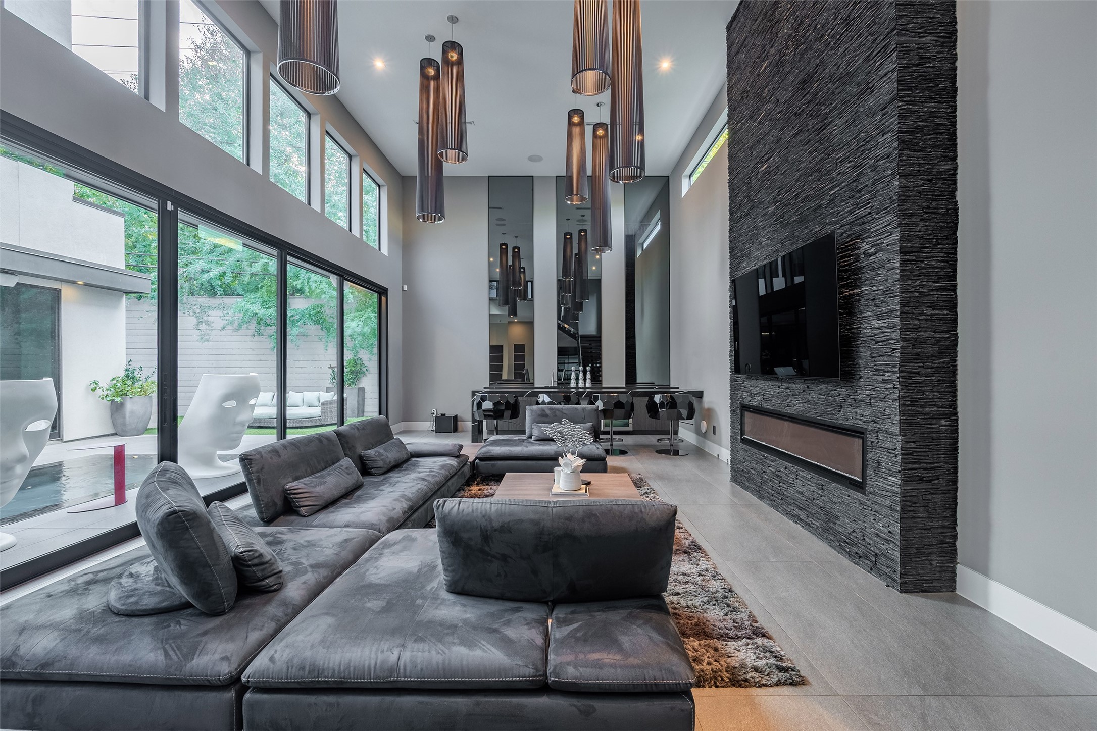 2302 Suffolk Drive Houston, TX 77027 - Photo 11 of 42 a living room with furniture and a flat screen tv