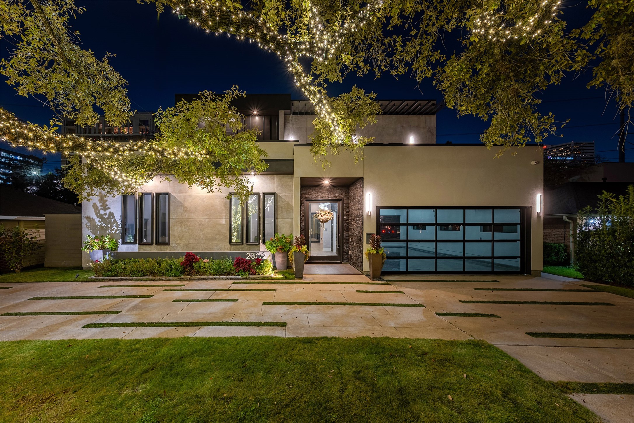 2302 Suffolk Drive Houston, TX 77027 - Photo 2 of 42 a view of a house with a yard