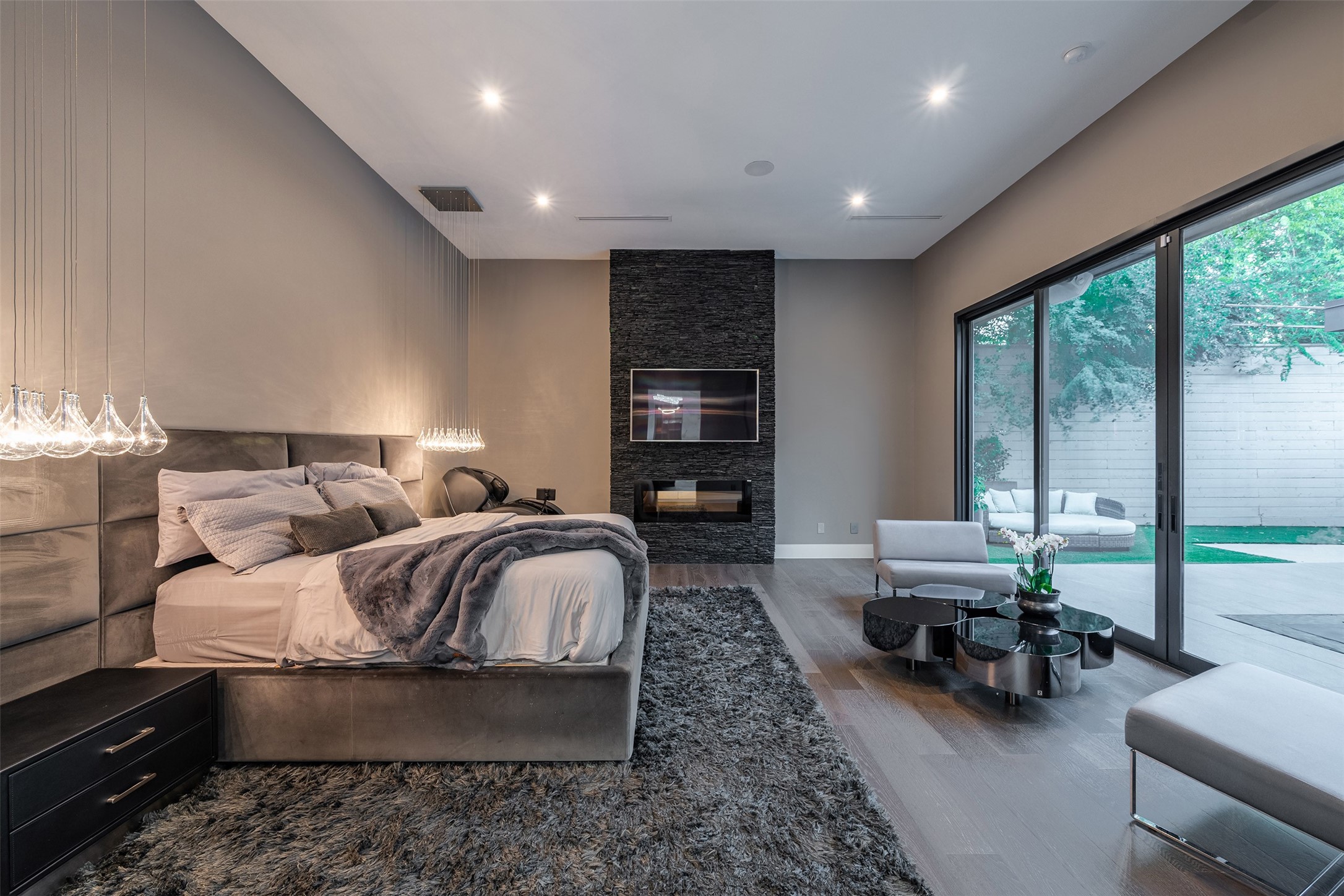 2302 Suffolk Drive Houston, TX 77027 - Photo 25 of 42 a bed room with furniture and a large window