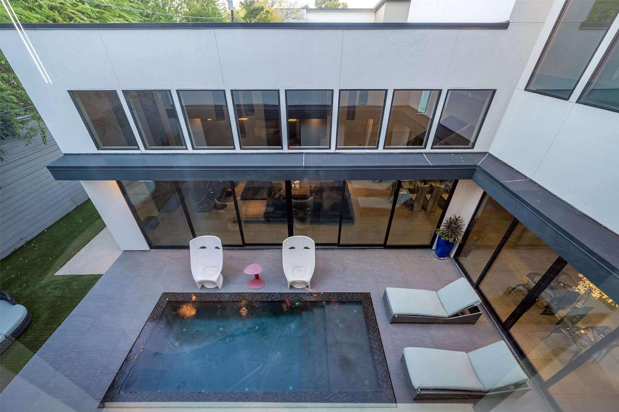 2302 Suffolk Drive Houston, TX 77027 - Photo 34 of 42 a porch with table and chairs