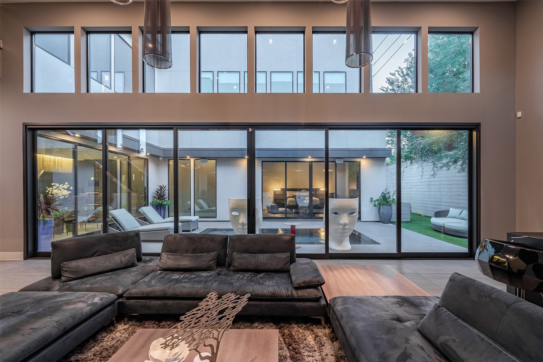 2302 Suffolk Drive Houston, TX 77027 - Photo 36 of 42 a living room with furniture and large windows