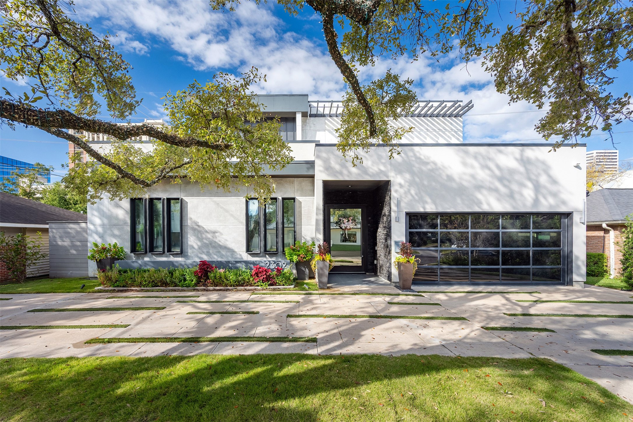 2302 Suffolk Drive Houston, TX 77027 - Photo 5 of 42 a view of a house with a yard