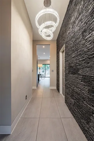 a kitchen with stainless steel appliances a sink stove and cabinets