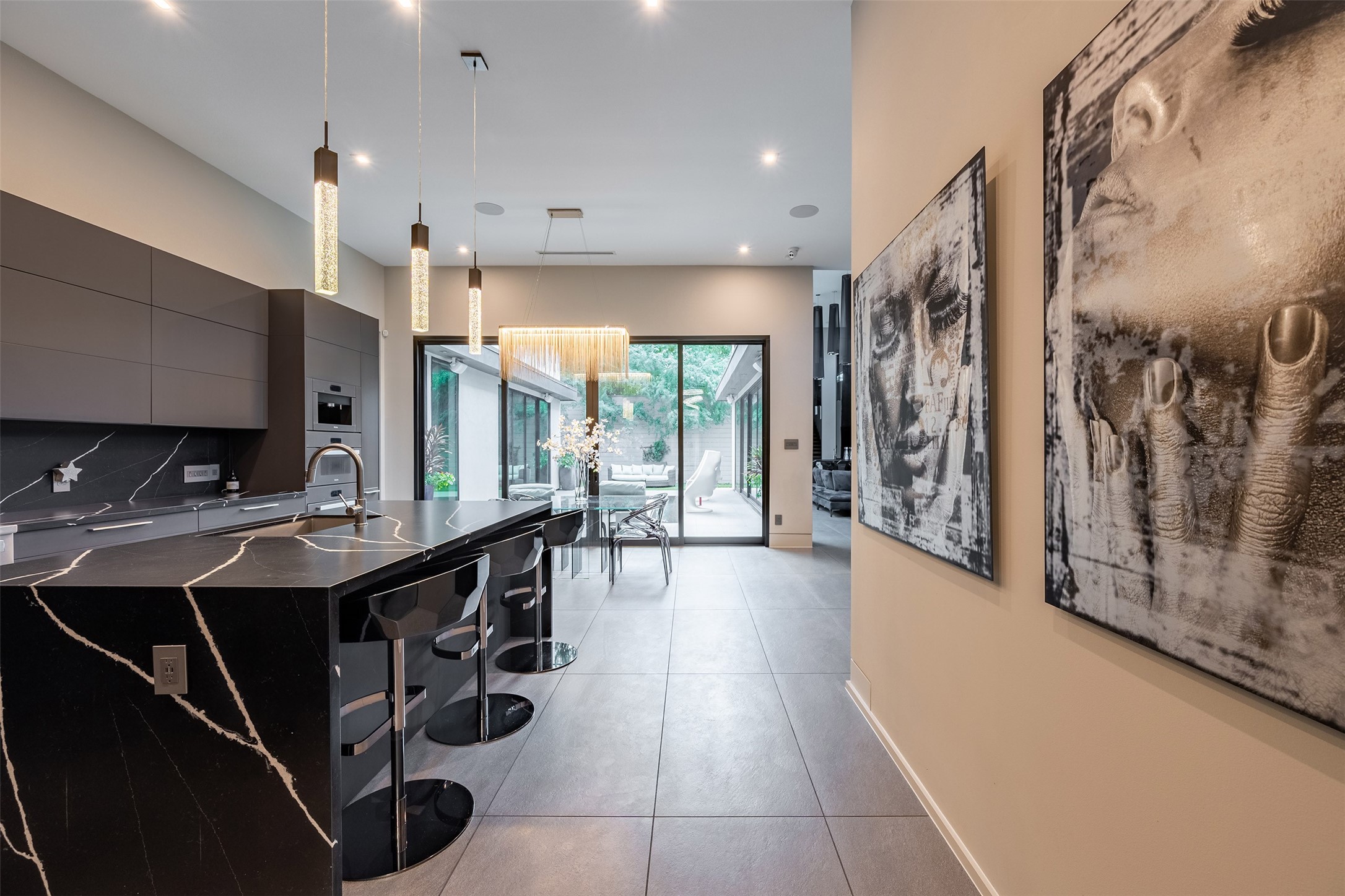 2302 Suffolk Drive Houston, TX 77027 - Photo 7 of 42 a kitchen with stainless steel appliances a sink stove and cabinets