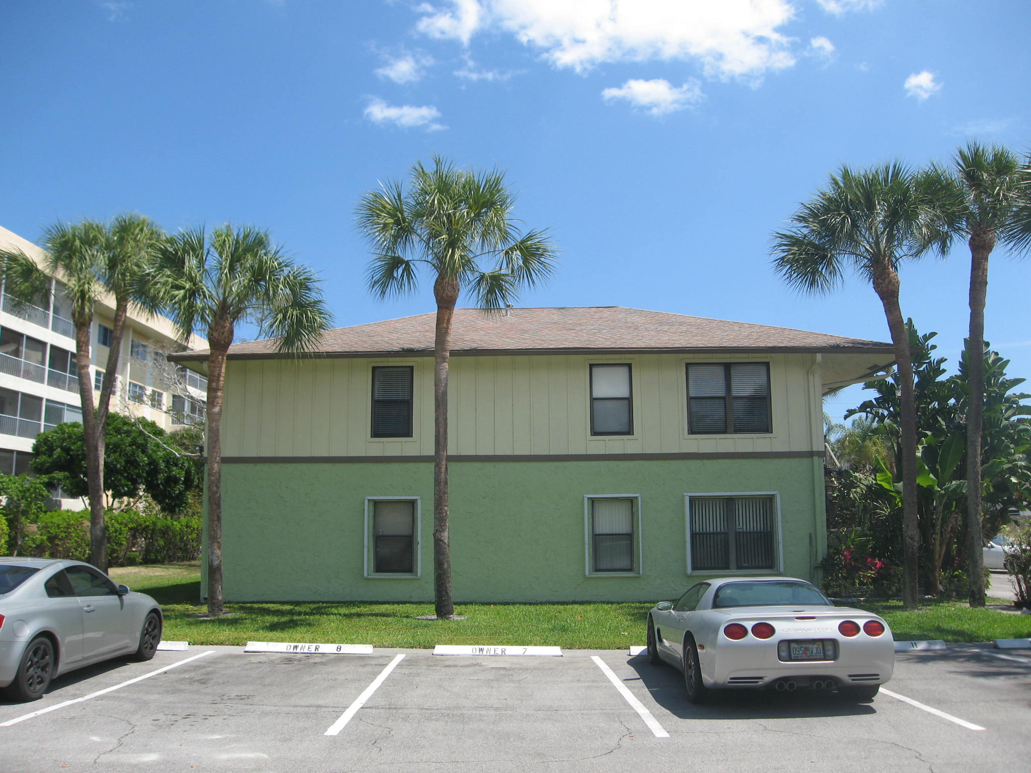 201 Southwest 1st Street, Unit 8 Boca Raton, FL 33432 - Photo 25 of 27 a car parked in front of a house