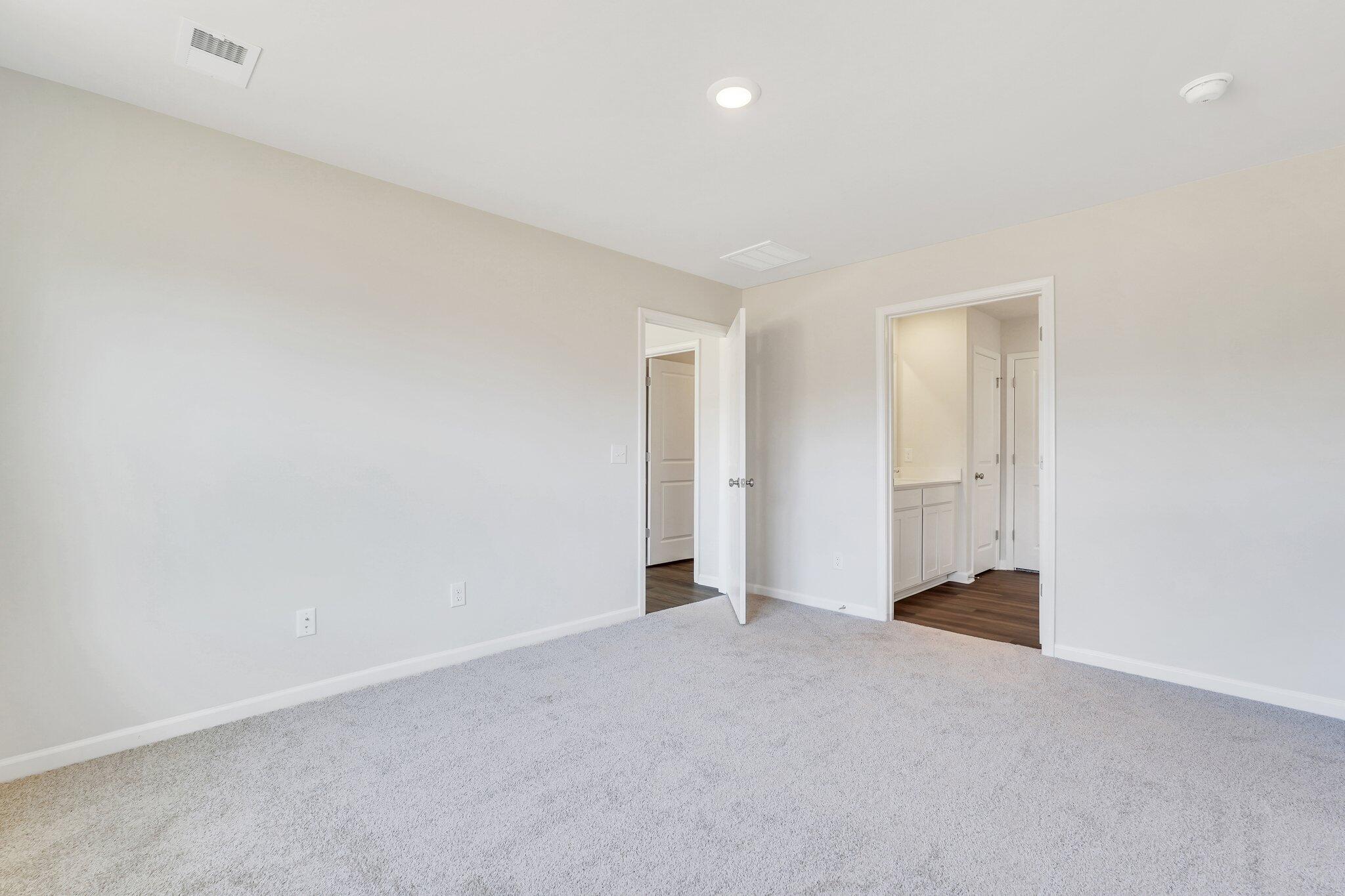 7006 Windham Way Ladson, SC 29456 - Photo 20 of 58 PRIMARY BED W/ ENSUITE